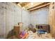Unfinished basement with concrete walls and floor, ready for storage or renovation at 25 Abelia Dr, Covington, GA 30014