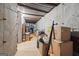 Unfinished basement featuring concrete walls, metal beams, and ample storage space at 25 Abelia Dr, Covington, GA 30014