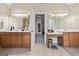 A luxurious bathroom with dual sinks, tiled floors and a walk in shower at 25 Abelia Dr, Covington, GA 30014