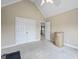Bedroom with carpeted floor, and double door closet at 25 Abelia Dr, Covington, GA 30014