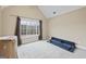 Bright bedroom with carpeted floor, natural light, and neutral walls at 25 Abelia Dr, Covington, GA 30014