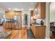 Spacious kitchen featuring wooden cabinets and stainless steel appliances at 25 Abelia Dr, Covington, GA 30014