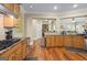 Kitchen showcasing wooden cabinets and granite countertops at 25 Abelia Dr, Covington, GA 30014