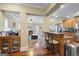 Open kitchen layout with a bar and access to other rooms at 25 Abelia Dr, Covington, GA 30014