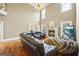 Living room features high ceilings, a fireplace, and an open archway to another room at 25 Abelia Dr, Covington, GA 30014