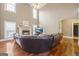 Spacious living room with a fireplace, vaulted ceilings, and ample natural light at 25 Abelia Dr, Covington, GA 30014
