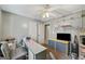 Bedroom featuring a ceiling fan, an organized closet, and a functional workspace at 232 Taylors Farm Dr, Canton, GA 30115