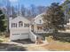 Classic home featuring a two-car garage, front porch, and driveway at 232 Taylors Farm Dr, Canton, GA 30115