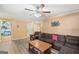 Cozy living room featuring a comfortable sofa, hardwood floors, and neutral paint at 232 Taylors Farm Dr, Canton, GA 30115