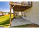Covered patio and deck accessible from the back of the house at 69 Oakhurst Trl, Sharpsburg, GA 30277