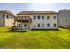 Two-story home with deck, patio and large backyard at 69 Oakhurst Trl, Sharpsburg, GA 30277