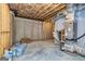 Unfinished basement area with HVAC unit and exposed utilities at 69 Oakhurst Trl, Sharpsburg, GA 30277