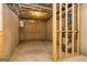 Unfinished basement with exposed pipes and a water heater at 69 Oakhurst Trl, Sharpsburg, GA 30277