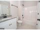 Bathroom with granite vanity, single sink and bathtub at 69 Oakhurst Trl, Sharpsburg, GA 30277