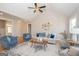 Spacious living room boasts vaulted ceilings, comfy seating, and a stylish rug at 69 Oakhurst Trl, Sharpsburg, GA 30277