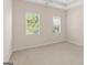 Bright bedroom featuring neutral walls and carpet at 3113 Brians Creek Se Dr, Conyers, GA 30013