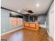 Unfinished basement with wet bar and hardwood floors at 504 Serene Waters Trl, Jonesboro, GA 30236