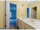 Clean bathroom with double sinks and access to a bedroom at 504 Serene Waters Trl, Jonesboro, GA 30236