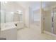 Primary bathroom with a large soaking tub and shower at 504 Serene Waters Trl, Jonesboro, GA 30236