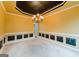 Bright dining room featuring a decorative chandelier and chair railing at 504 Serene Waters Trl, Jonesboro, GA 30236