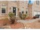 Front entry with steps leading to a covered porch at 504 Serene Waters Trl, Jonesboro, GA 30236