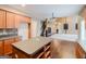 Open kitchen with an island and view into the living room at 504 Serene Waters Trl, Jonesboro, GA 30236
