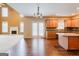 Eat-in kitchen with island, hardwood floors, and access to deck at 504 Serene Waters Trl, Jonesboro, GA 30236