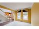 Living room with hardwood floors and view of staircase at 504 Serene Waters Trl, Jonesboro, GA 30236