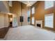 Spacious living room with a fireplace and high ceilings at 504 Serene Waters Trl, Jonesboro, GA 30236