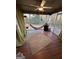 Relaxing screened porch with ceiling fan and hammock at 3025 Sumit Wood Nw Dr, Kennesaw, GA 30152