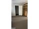 Bedroom with carpeted floors and closet at 1597 Highway 92 S, Fayetteville, GA 30215