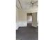 Bedroom with carpeted floors and closet at 1597 Highway 92 S, Fayetteville, GA 30215