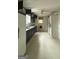 Kitchen with dark cabinets and vinyl flooring at 1597 Highway 92 S, Fayetteville, GA 30215