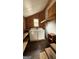 Functional laundry room with a washer, dryer, and shelving, ideal for convenient home chores at 1597 Highway 92 S, Fayetteville, GA 30215