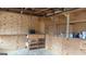 Functional storage area with wooden walls, shelves, and cabinets, offering versatile organization solutions at 1597 Highway 92 S, Fayetteville, GA 30215