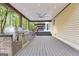 Spacious back patio with grilling station and built-in seating at 150 S Kite Lake Rd, Fayetteville, GA 30214