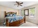 Bedroom with a large bed and ceiling fan at 150 S Kite Lake Rd, Fayetteville, GA 30214