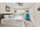 Bright bedroom with double windows and blue accent chair at 150 S Kite Lake Rd, Fayetteville, GA 30214