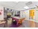 Basement game room featuring a pool table, bar, and seating area at 150 S Kite Lake Rd, Fayetteville, GA 30214