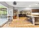 Kitchen with breakfast nook and view of the living room at 150 S Kite Lake Rd, Fayetteville, GA 30214