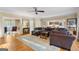 Open living space with a sectional sofa and views into the kitchen at 150 S Kite Lake Rd, Fayetteville, GA 30214