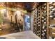 Elegant wine cellar with extensive storage and Italian-inspired mural at 150 S Kite Lake Rd, Fayetteville, GA 30214