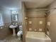 Clean bathroom with pedestal sink and shower/tub combo at 730 N Carter Dr, Jonesboro, GA 30236