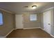 Bright dining room featuring tile floors and two entryways at 730 N Carter Dr, Jonesboro, GA 30236