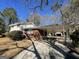 Side view of brick ranch home with carport at 730 N Carter Dr, Jonesboro, GA 30236
