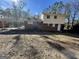 Brick ranch house with covered patio and detached garage at 730 N Carter Dr, Jonesboro, GA 30236