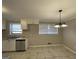 Eat-in kitchen with tile floors and window at 730 N Carter Dr, Jonesboro, GA 30236