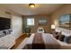 Main bedroom with hardwood floors and large closet at 730 N Carter Dr, Jonesboro, GA 30236