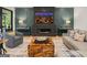 Living room featuring modern decor, a cozy fireplace, and stylish furnishings for comfortable living at 200 Simonton Rd, Lawrenceville, GA 30046