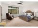 Cozy main bedroom with large windows providing natural light and scenic views at 200 Simonton Rd, Lawrenceville, GA 30046